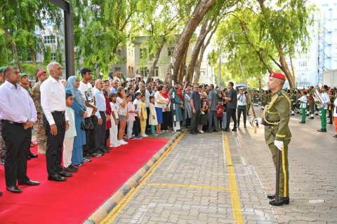 The President and First Lady observe the Independence Day military parade and display